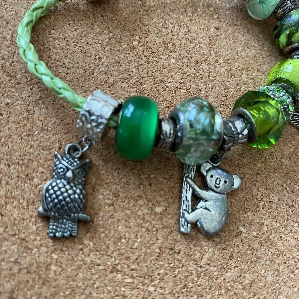 Green child charm bracelet koala